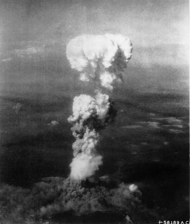 Atomic mushroom cloud rising over Hiroshima 6 August 1945 photographed from B-29 Enola Gay
