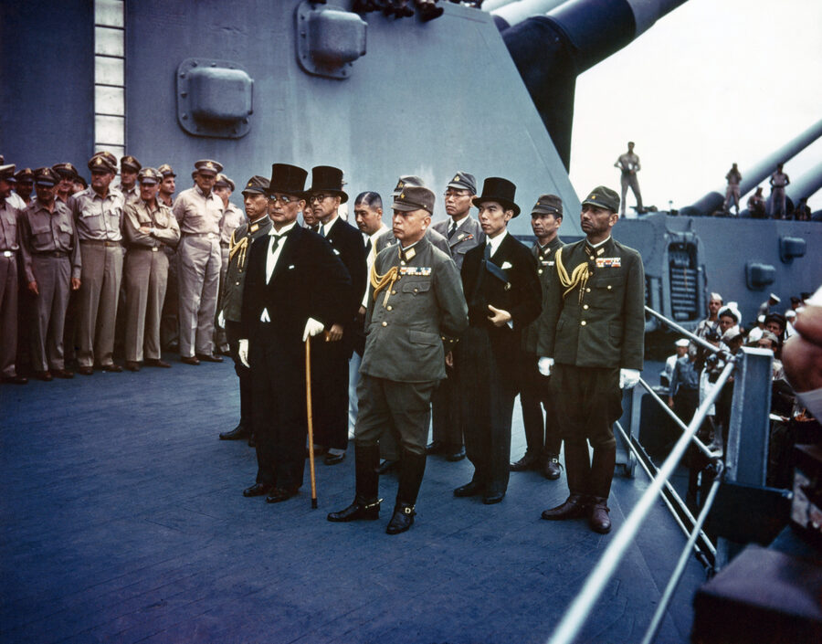 Mamoru Shigemitsu signing the Japanese Instrument of Surrender aboard USS Missouri 2 September 1945