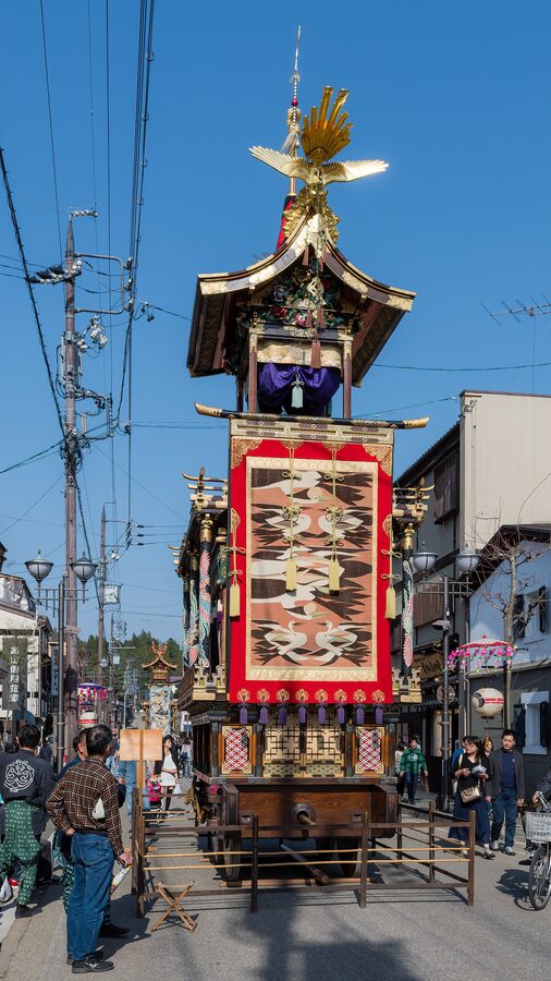 Close-up of Takayama yatai gilt phoenix carving and lacquered woodwork