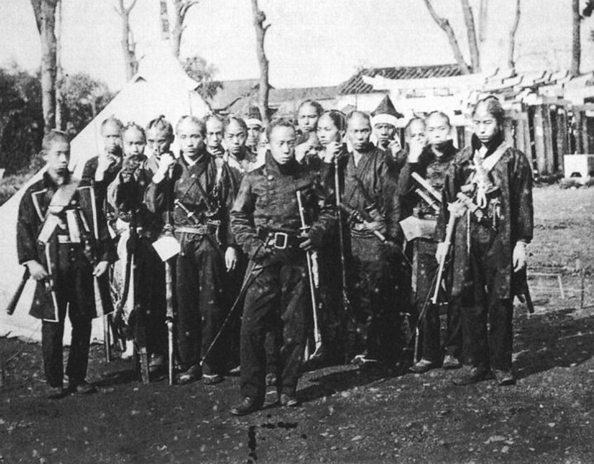 Tokugawa shogunate infantry posed in French-pattern uniforms with rifles, photographed circa 1867