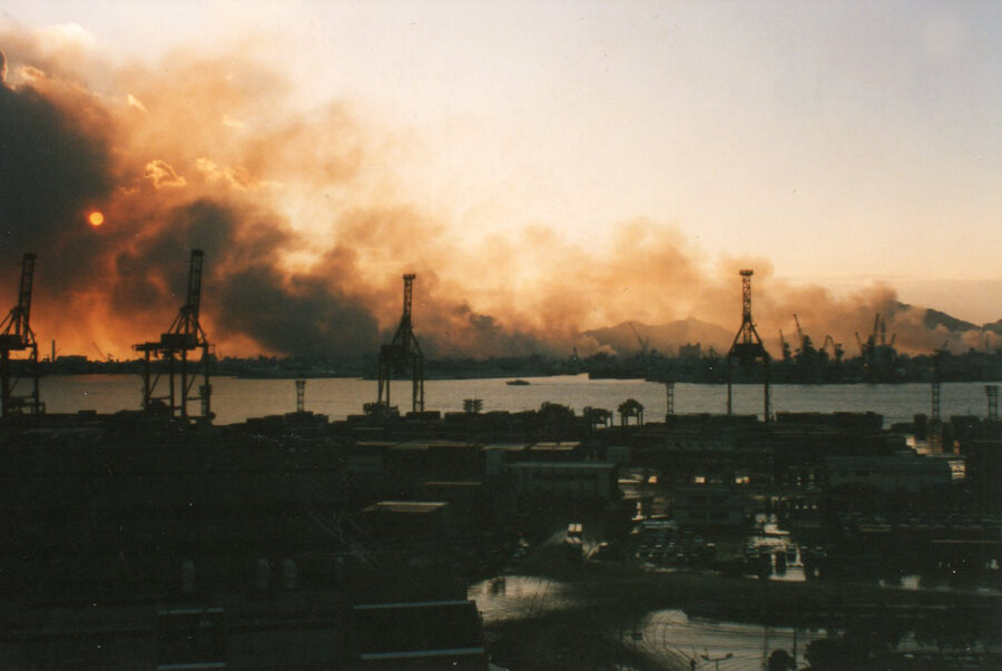 Smoke and fires across Kobe city seen from Port Island after the 1995 earthquake