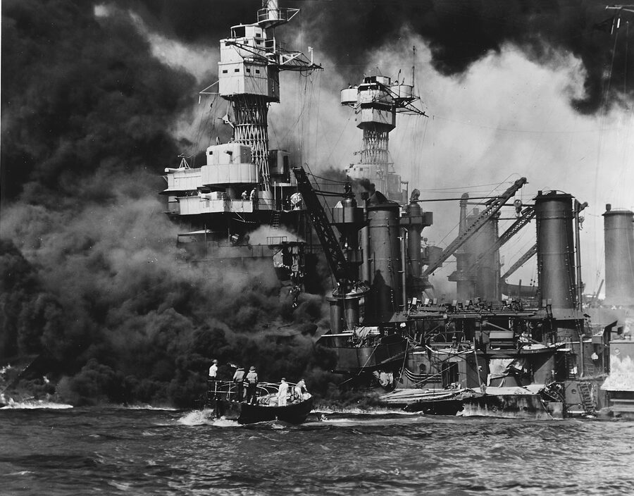 USS West Virginia BB-48 burning at Pearl Harbor 7 December 1941 small boat rescuing seaman