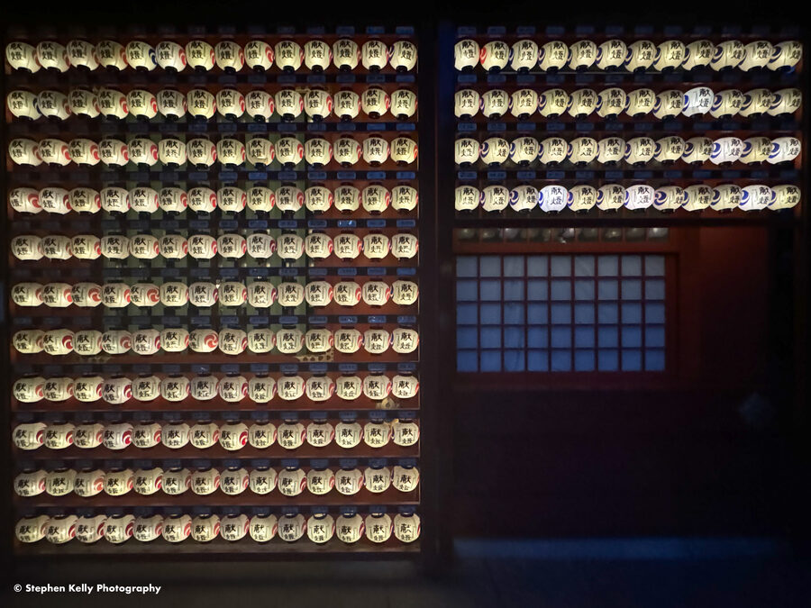 A wall of red paper lanterns hanging at Kanda Myojin shrine in Akihabara, Tokyo.