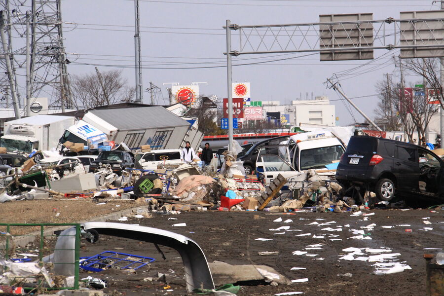 Twisted vehicles and debris at Sendai port three days after the 11 March 2011 tsunami