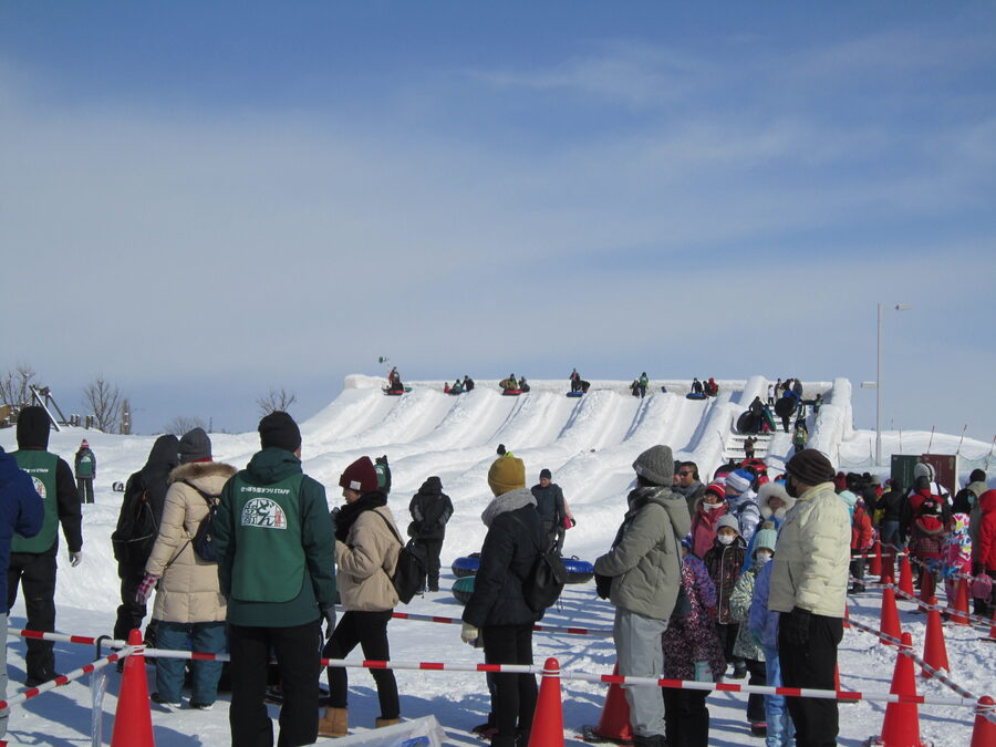 Family tube slide setup at the Tsudome venue of the 71st Sapporo Snow Festival