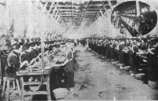 Interior view of Tomioka Silk Mill reeling room with rows of steam-powered French silk reels operated by Japanese women workers, photographed circa 1880