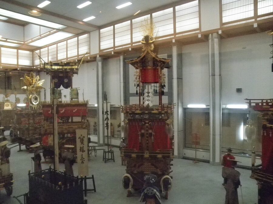 Yatai Kaikan gilt-bronze and carved wood detail of an autumn float