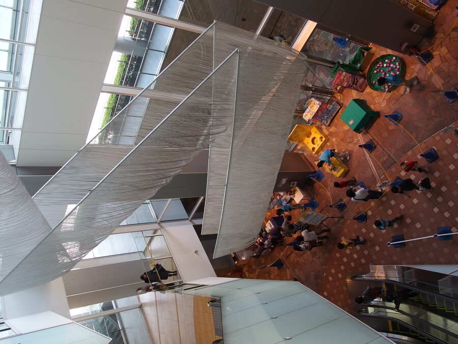 Brightly lit Pokemon Center storefront with Pikachu signage in Hamamatsucho Minato Tokyo