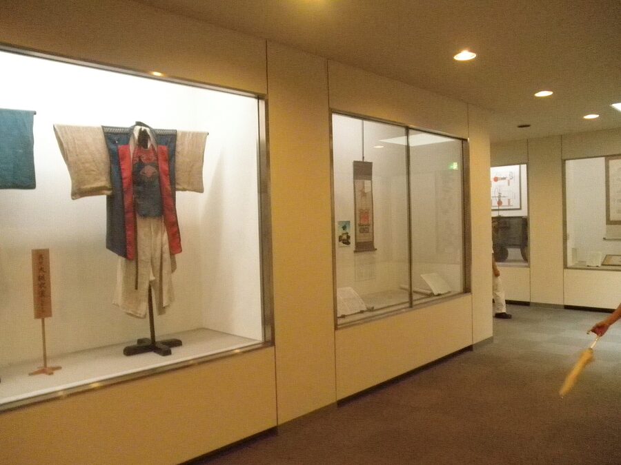 Storehouse-style interior of Takayama Yatai Kaikan with wood-beamed ceiling
