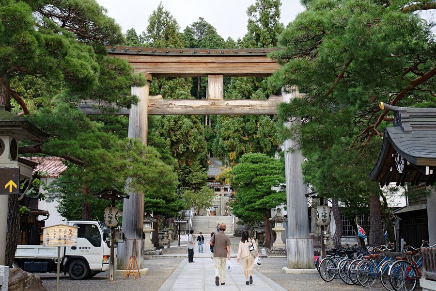 Stone steps and torii leading to Sakurayama Hachimangu shrine in autumn
