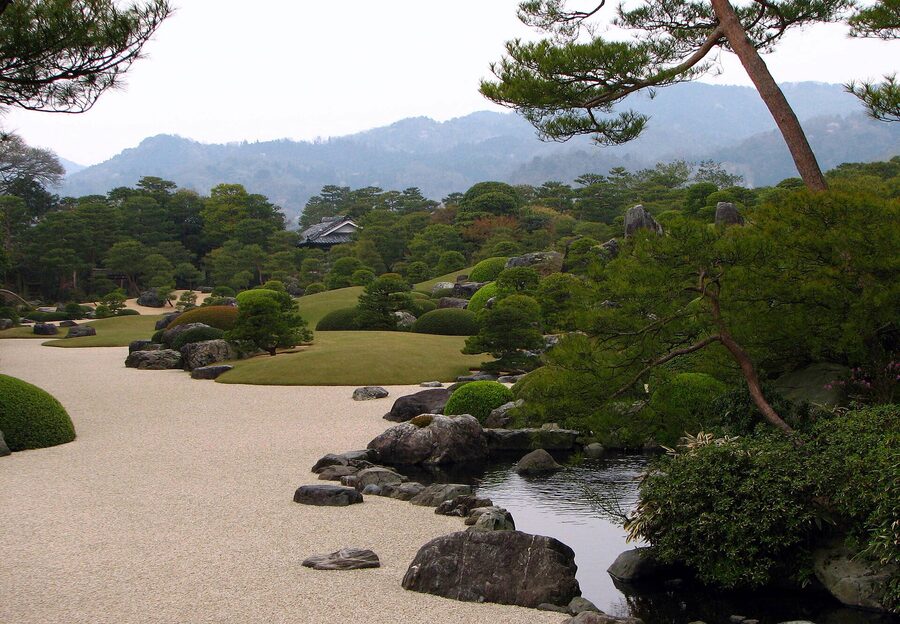 White gravel river and clipped pines at Adachi Museum garden