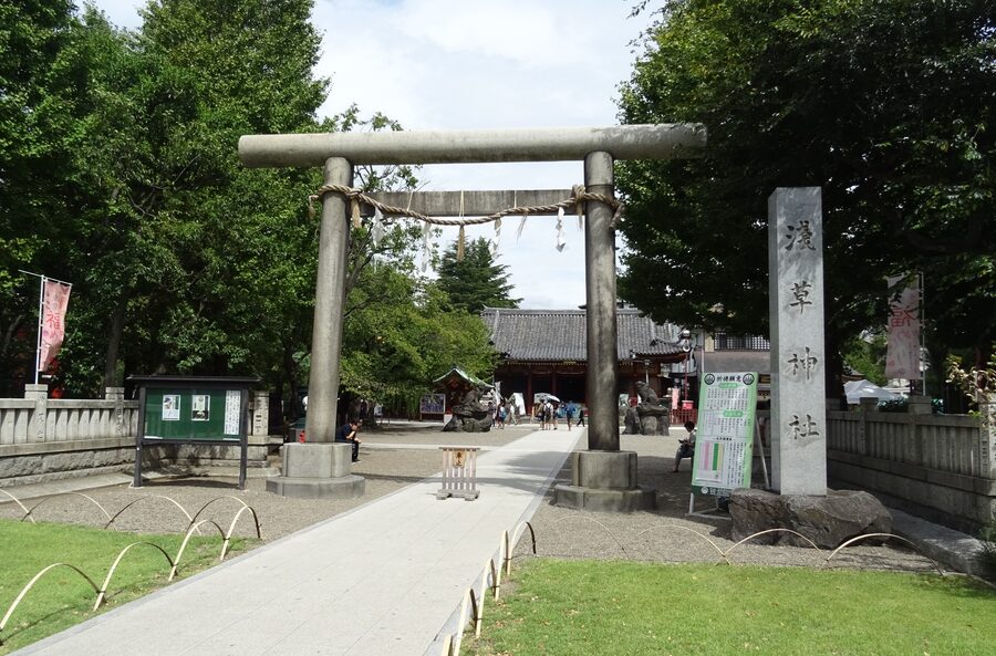 Stone torii gate at the entrance to Asakusa Shrine