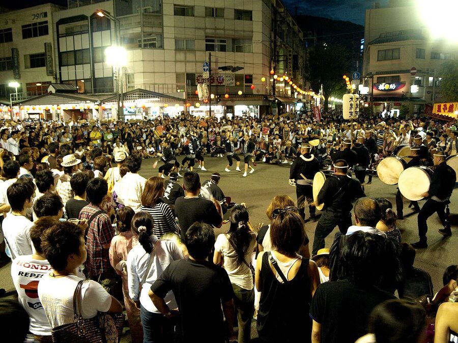 Awa Odori dance troupe parading near the Ryogoku Bridge in Tokushima city during the Awa Odori festival