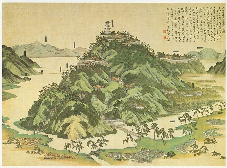 Painting of Azuchi Castle on silk by Iwasaki Ou dated 1855, showing the seven-storey tenshu with octagonal upper floors on Mount Azuchi by Lake Biwa, held at the Osaka Castle Museum