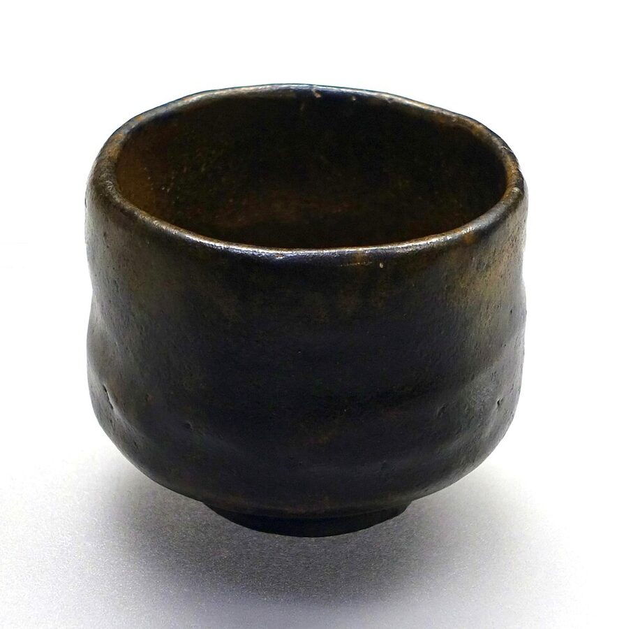 Chojiro black raku tea bowl named Suehiro at the Tokyo National Museum, hand-moulded ceramic commissioned by Sen no Rikyu in the 1580s