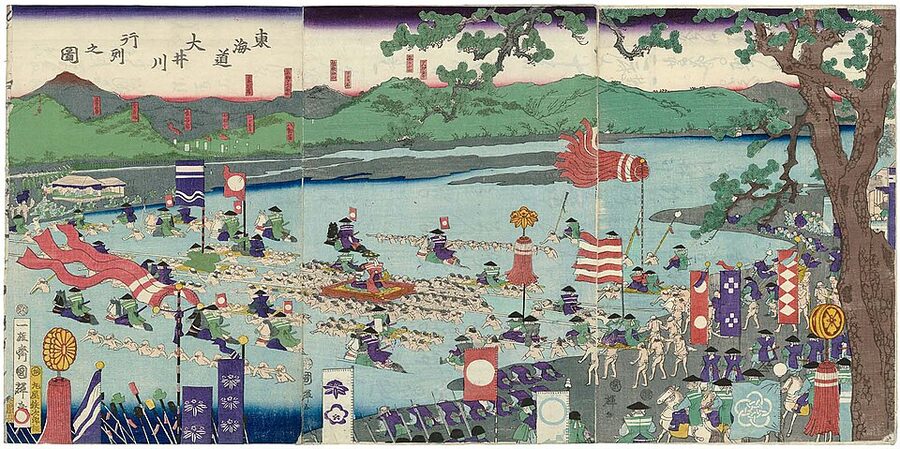 1865 Utagawa Kuniteru II ukiyo-e showing a large daimyo procession being carried across the un-bridged Oi River on the Tokaido
