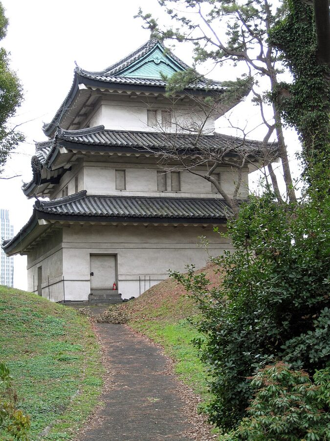 Fujimi-yagura three-tier corner turret of Edo Castle on the original 1659 stone base seen from the Imperial Palace grounds