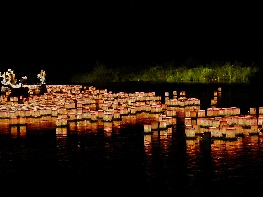 Floating toro lanterns on the precinct stream of Eiheiji Zen temple in Fukui prefecture during Obon