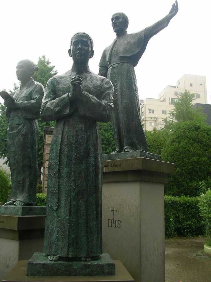 Statue of the Jesuit missionary Francis Xavier with Anjiro and Bernardo the first Japanese Christians at Xavier Park in Kagoshima where Xavier landed in 1549
