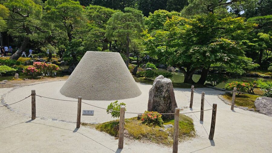 The Kogetsudai a meticulously raked sand cone said to symbolize Mount Fuji or to reflect moonlight onto the Silver Pavilion at Ginkaku-ji Kyoto