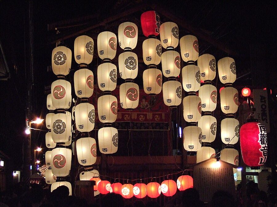 Minami-Kannon-yama yamaboko float decorated with lanterns and tapestries during Gion Matsuri Yoiyama