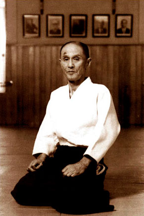 Gozo Shioda, founder of Yoshinkan aikido, in a portrait on the dojo wall