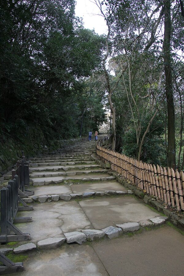 Hikone Castle tenshu close detail of the third story with kato-mado bell-shaped windows and red-lacquered railings