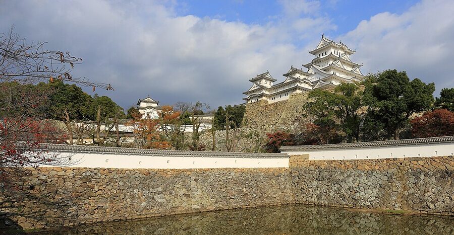 Himeji Castle main keep or daitenshu seen from Nishinomaru courtyard, the white-plastered five-story tower that survived World War II bombing