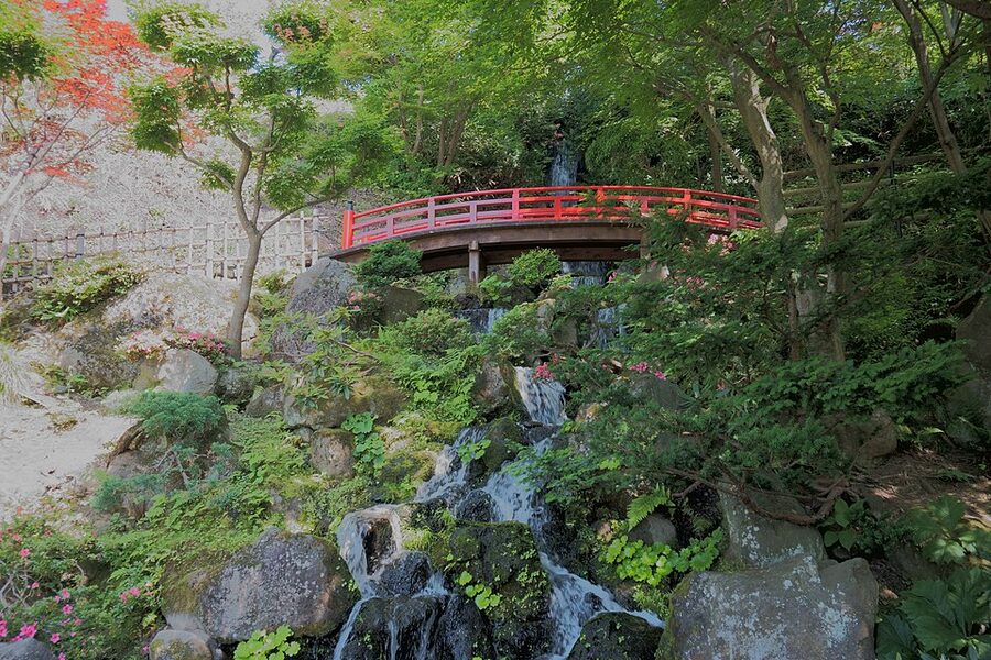 Fujita Memorial Garden in Hirosaki photographed in June 2022 showing the strolling pond and Japanese-style residence built in 1921 for Meiji-era merchant Fujita Kenichi