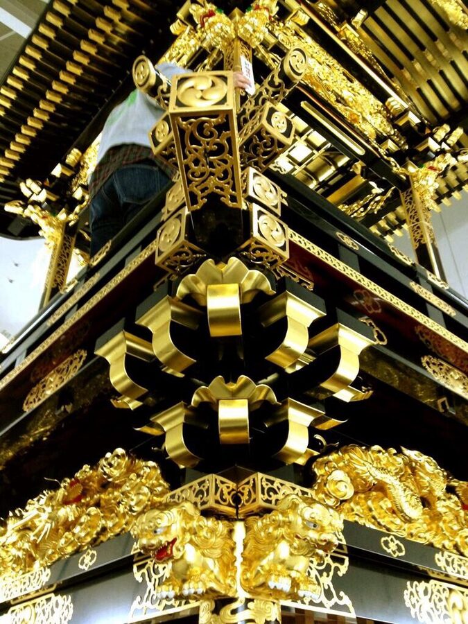 Three-tier yamaboko parade float during Inuyama Matsuri in the old castle town streets