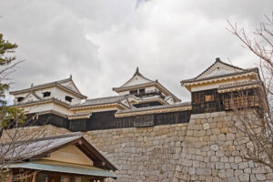 Iyo-Matsuyama Castle three-storey main tenshu atop Mount Katsuyama in Ehime Prefecture the newest surviving original-construction keep in Japan built in 1854