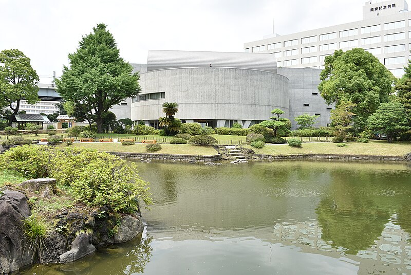 Exterior of the Japanese Sword Museum Token Hakubutsukan a modern concrete building in Ryogoku Tokyo with approach path and landscaped entrance