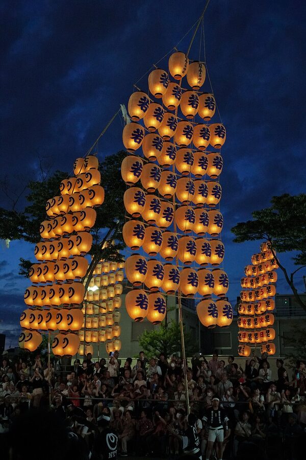 Vertical kanto bamboo pole laden with 46 paper lanterns Akita 2023