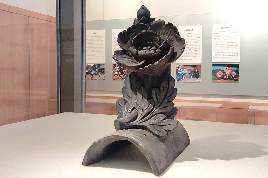 Display of decorative kazarigawara ornamental tiles at the Kawara Museum in Omihachiman