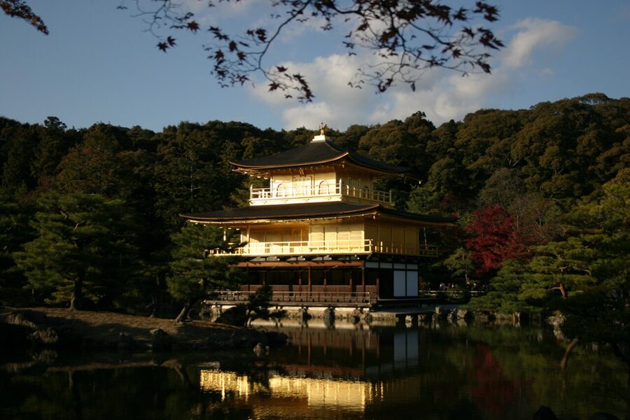 Kinkaku-ji the Golden Pavilion in Kita ward Kyoto built by Ashikaga Yoshimitsu in 1397 reflected in Kyoko-chi mirror pond on a clear day