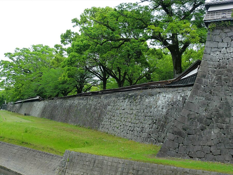 Collapsed Nagabei long wall section at Kumamoto Castle after the April 2016 earthquake with timber-clad wall laid flat on the ground