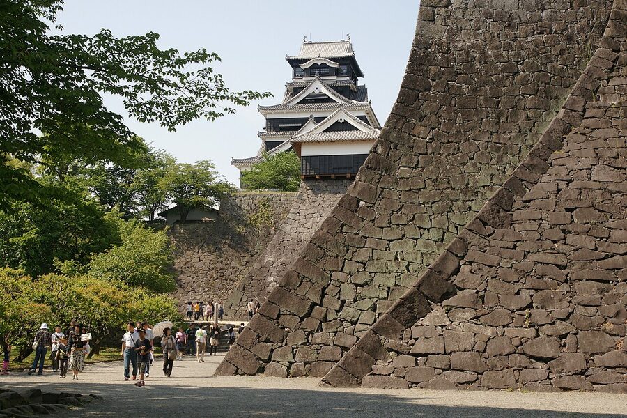 Kumamoto Castle keeps and yagura seen from elevation, the approach over the honmaru stone walls and plinth