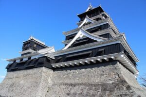 Kumamoto Castle daitenshu and kotenshu main and small keep seen from honmaru courtyard after 2021 exterior restoration
