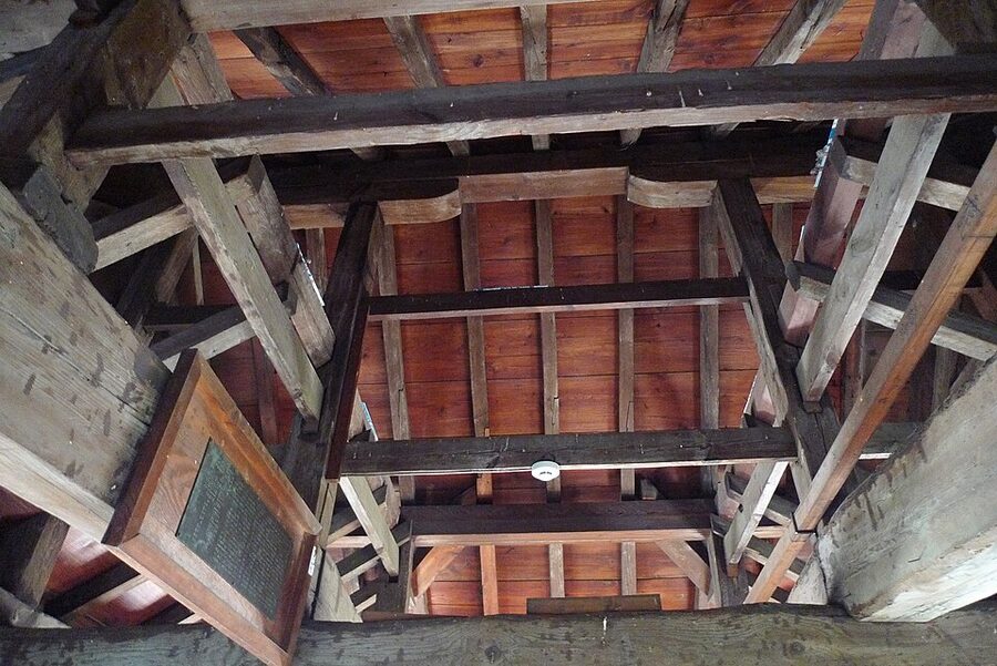 Interior wooden beams and timberwork inside the Marugame Castle tenshu