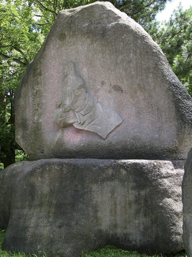 Stone relief sculpture of Matsu Maeda at Oyama Shrine in Kanazawa commemorating her role as Maeda Toshiies wife and Edo-era domain matron