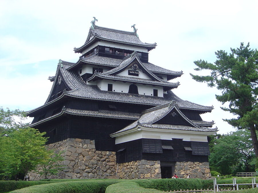 Matsue Castle keep reflected in the inner moat