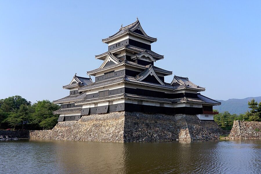 Matsumoto Castle five-tenshu connected-complex renketsu-fukugo type keep with daitenshu inui-kotenshu watari-yagura tatsumi-tsukeyagura and tsukimi-yagura visible in summer light