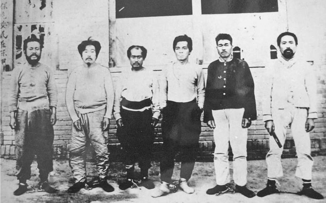 Onisaburo Deguchi and Morihei Ueshiba in shackles after arrest by Chinese authorities in Inner Mongolia, 1924