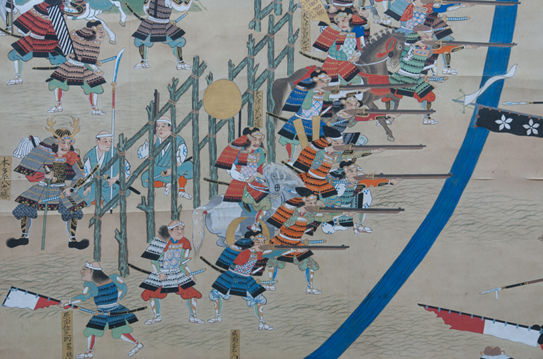 Edo-period six-fold painted screen showing the Battle of Nagashino with Nobunagas palisade defense and the Takeda cavalry charges against it