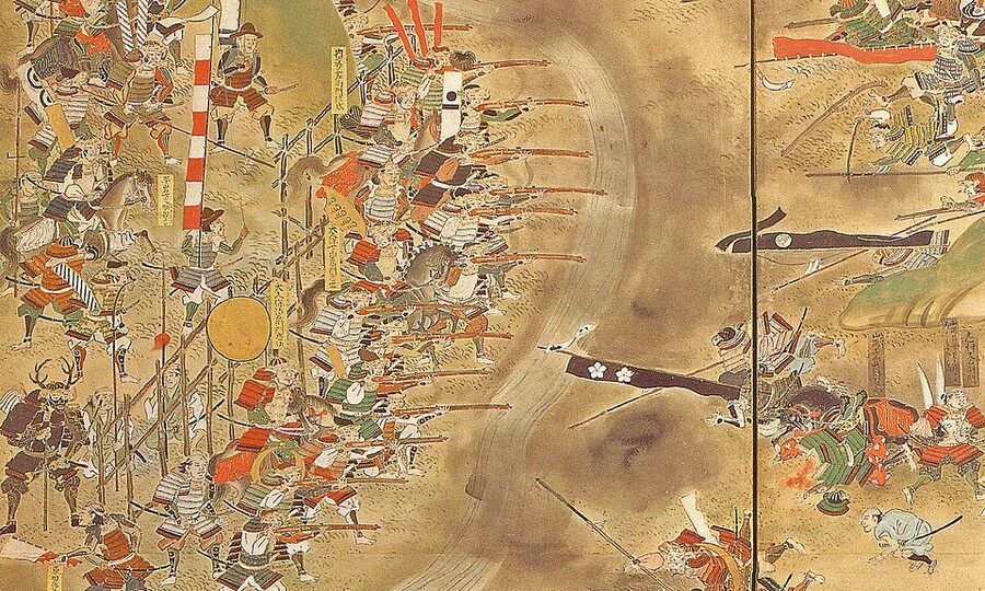 Edo-period painted detail of teppo-ashigaru musket-bearing foot soldiers firing from behind Nobunagas palisade at Nagashino 1575