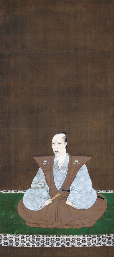 Formal portrait of Oda Nobunaga painted in 1584 by Kano Eitoku two years after Nobunagas death, held at Daitoku-ji Kyoto — the lord who captured Gifu Castle in 1567