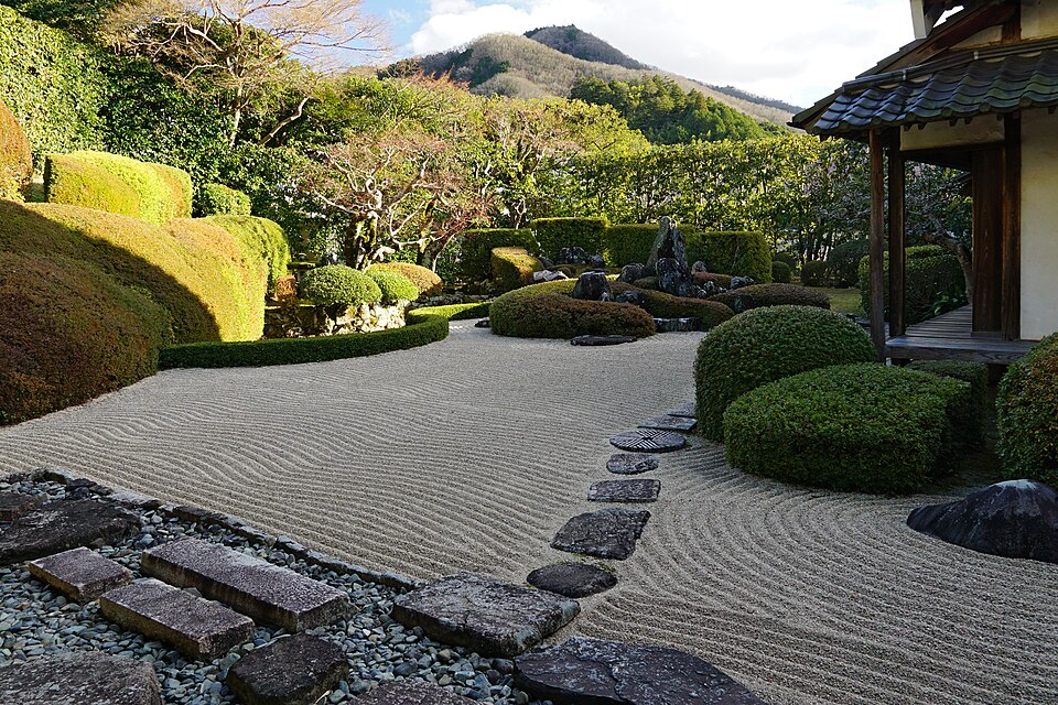 Raikyu-ji temple garden in Takahashi designed by Kobori Enshu around 1605 showing the karikomi azalea hedges shaped into a tsuru-kame crane-and-turtle landscape