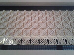 Hana Ramma flower-motif carved transom at Nagoya Castle Hommaru Palace reconstruction showing classic Edo-period sukashi-bori openwork carving