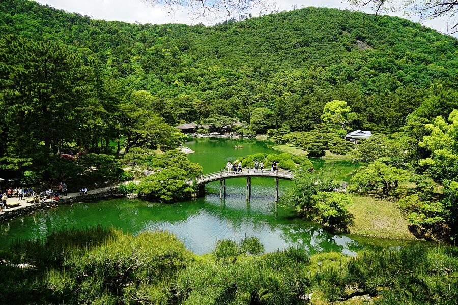 North pond and arched bridge at Ritsurin Garden Takamatsu
