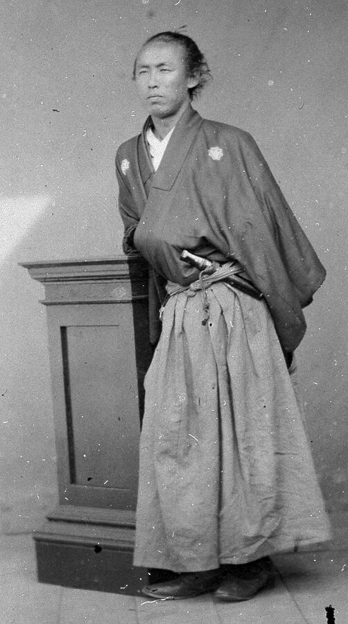 Famous photograph of Sakamoto Ryoma by Ueno Hikoma showing the Tosa-born revolutionary who brokered the 1866 Satcho Alliance and was born about one kilometer from Kochi Castle